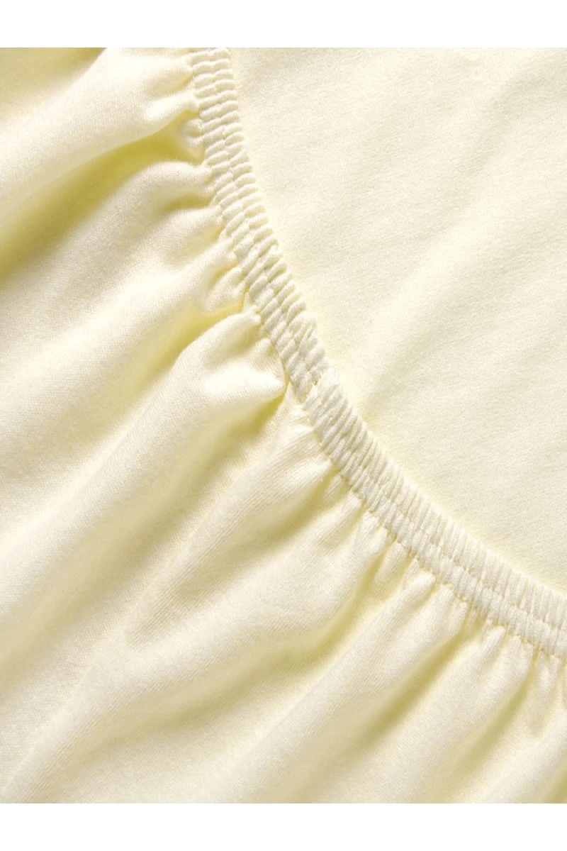 Простыня трикотажная на резинке (кремовый)